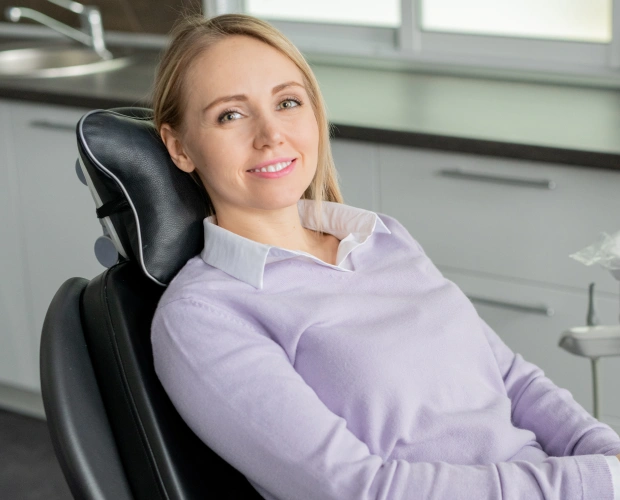 New patient smiling during a dental consultation