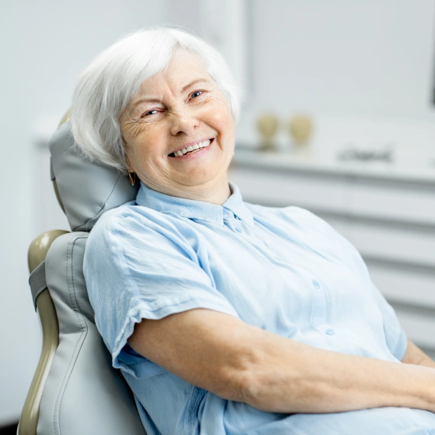 Senior patient relaxing after root canal therapy