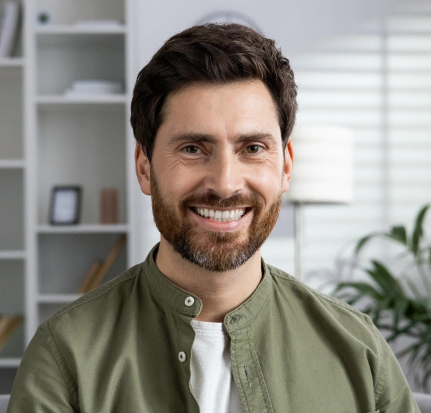 Patient smiling after professional teeth whitening treatment